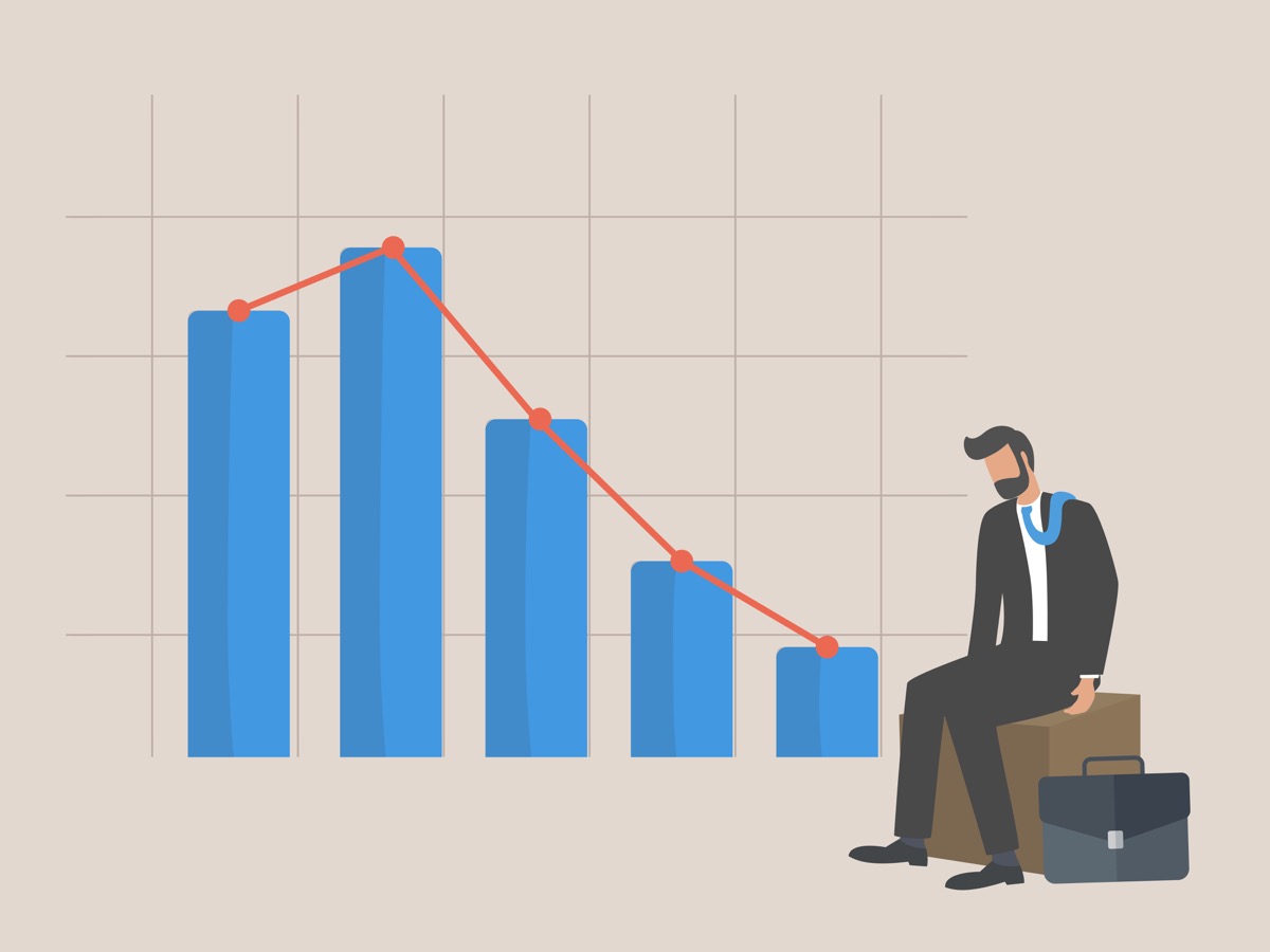 freepik-businessman_sitting_listless_due_to_decreasing_graphic_chart
