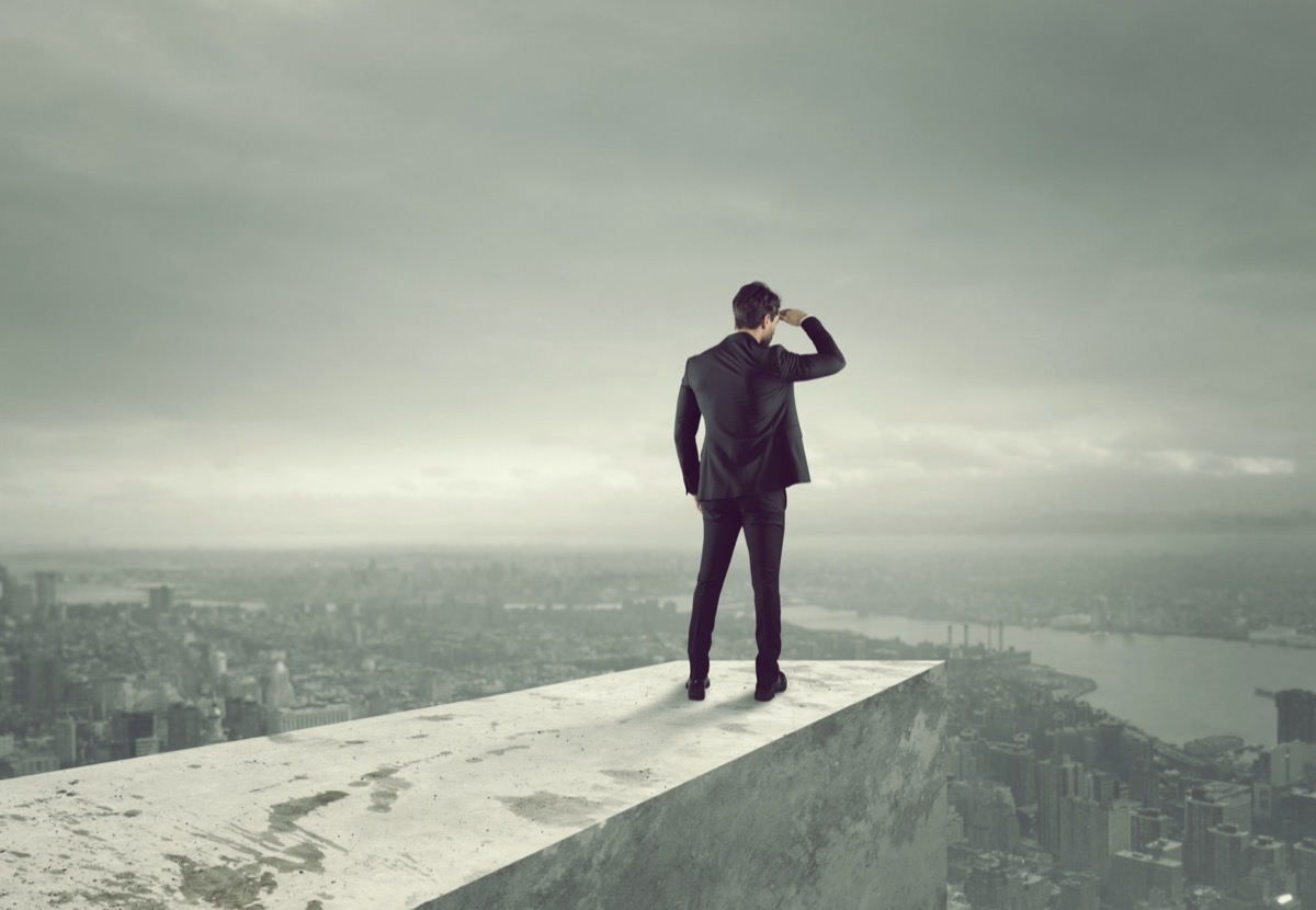 freepik-businessman-looks-at-the-city