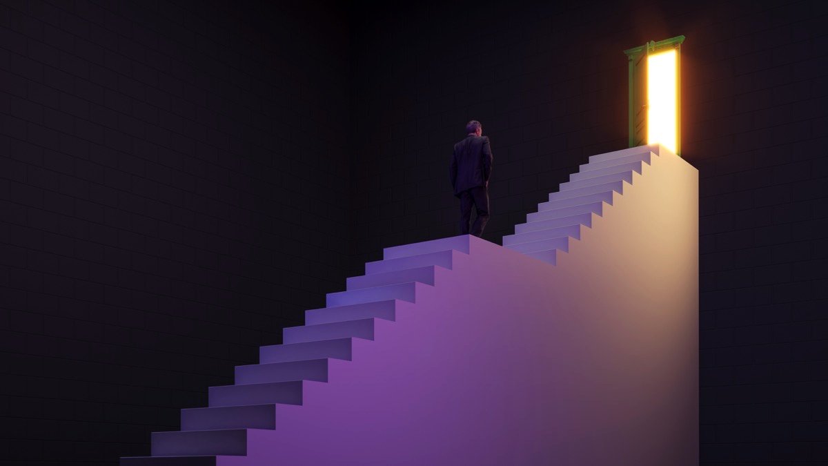 freepik-businessman-walking-up-on-stairs