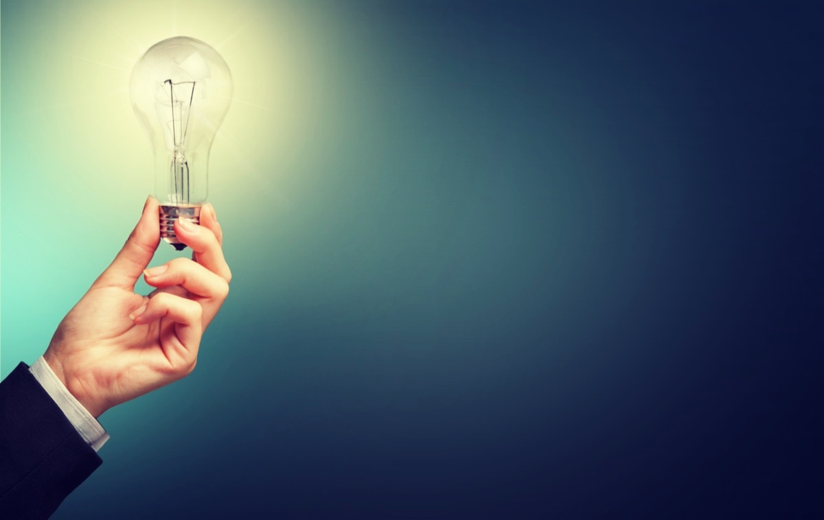 freepik-businessman-holding-light